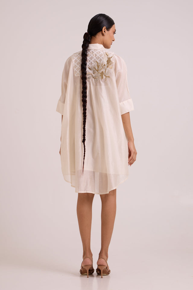 Mimi ivory shirt dress back view showing the embroidered yoke and longer back hem
