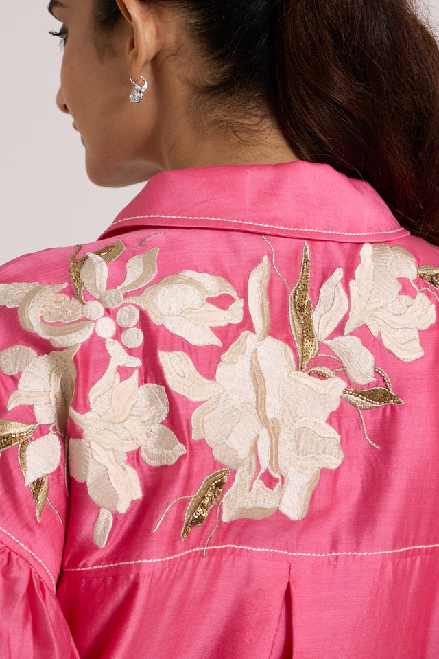 Close back view of the Avina pink dress collar and ivory floral applique on the yoke