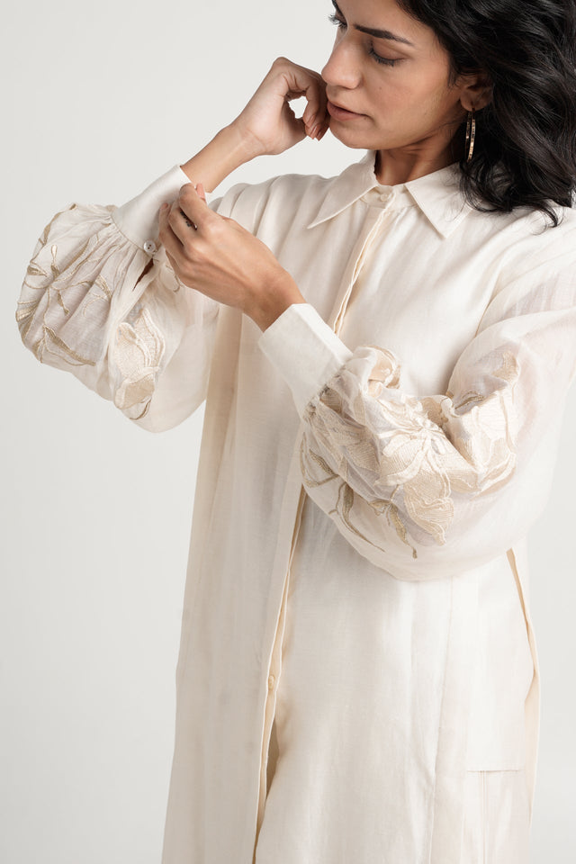 Close view of the Buckler ivory kurta sheer balloon sleeve with tonal embroidery