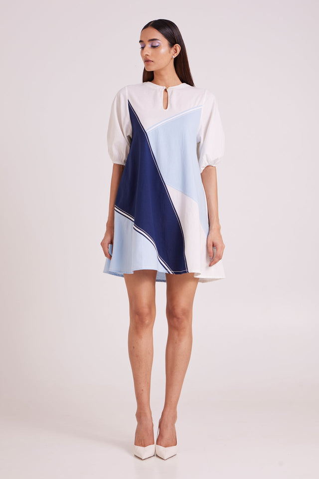 Juno short dress with keyhole neck and diagonal navy and blue panels, straight front view