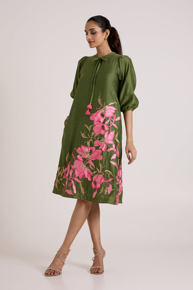 Olive Vinny day dress with pink tassel neck tie, three quarter front view