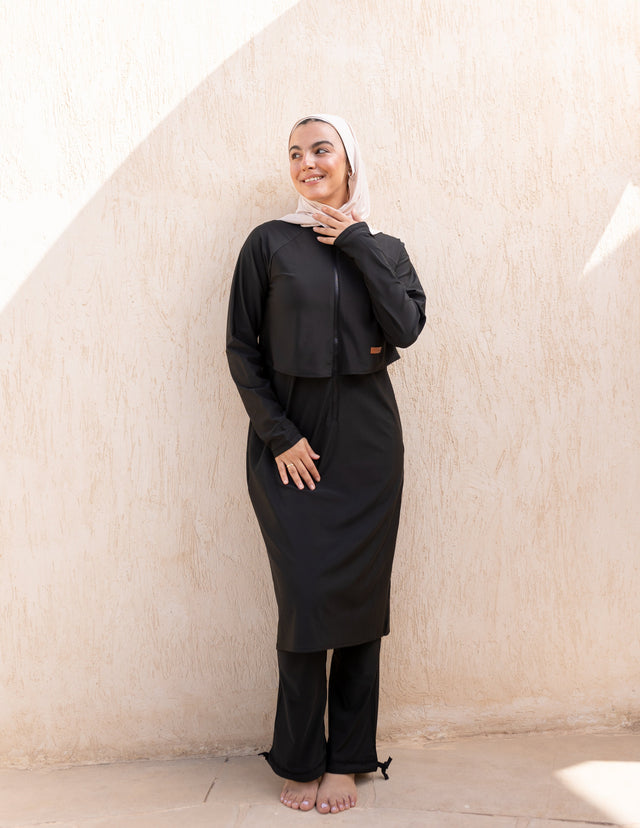توب سباحة فلو أسود طويل بسحّاب أمامي