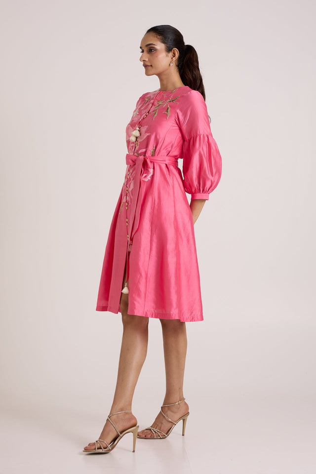 Jay pink Delphi tie waist dress with tassel ties, three quarter side view