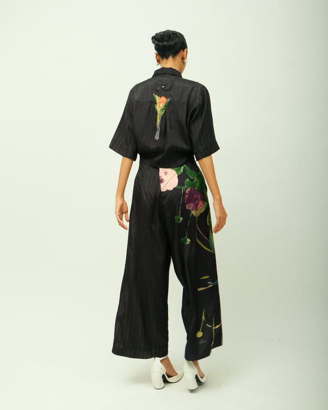 Psyflora shirt set back view showing the painted flower on the shirt and floral trousers