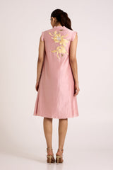 Ice pink Helga day dress back view showing the yellow floral applique on the back