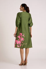 Olive Vinny brunch day dress back view showing the floral hem and puff sleeves