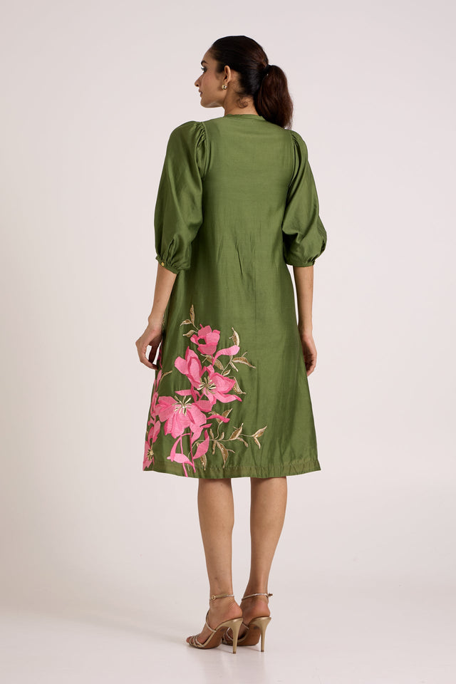 Olive Vinny brunch day dress back view showing the floral hem and puff sleeves