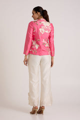 Jay pink Eddie wrap top and ivory pants, back view showing the floral applique on the back
