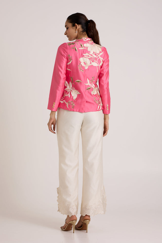Jay pink Eddie wrap top and ivory pants, back view showing the floral applique on the back
