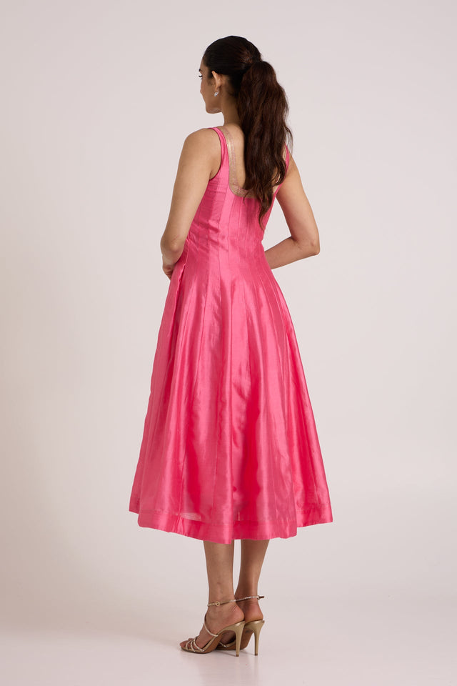 Jay pink Hira-Jun panelled midi dress without the jacket, back view of the flared skirt