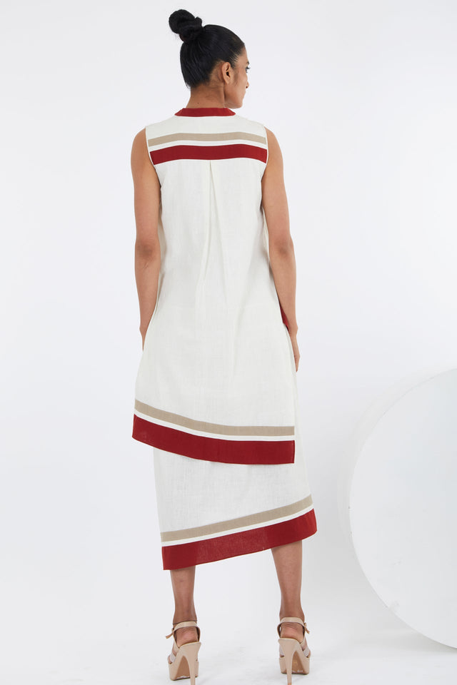 Sachi ivory layered midi dress, back view showing the red and beige banded tiers