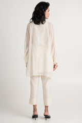 Alba ivory beach tunic and pants, back view showing the sheer sleeves