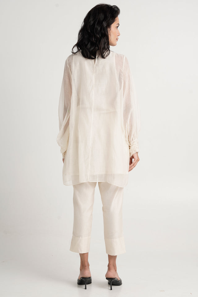 Alba ivory beach tunic and pants, back view showing the sheer sleeves