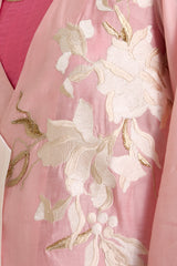 Close-up of the Hira-Jun jacket ivory floral applique with gold leaf details