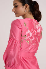 Close back view of the Delphi pink dress floral applique and gathered bell sleeve