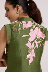 Close back view of the Stacy olive vest with pink floral applique across the shoulder