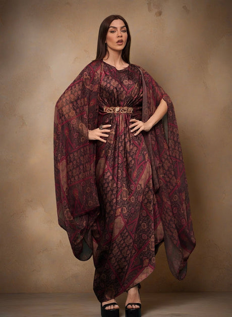 Model wearing the Qasr Kaftan Set with cape sleeves spread, front view