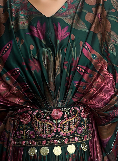 Close-up of the Risha Kaftan embroidered waistband with gold coins and pleated print