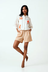 Ivory Zola Raglan Sleeve Crop Shirt and Shorts by Madder Much, shirt with orange floral appliques and beige shorts