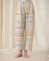 Ivory Ash Printed Pants with pastel patchwork print, back view