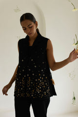 Black Denim Jacket with side tie and eyelet embellishment, three quarter front view