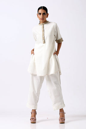 Ivory Sabah Mandarin Tunic Set by Madder Much, tunic with beige trimmed placket and cuffs and tapered pants