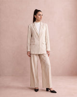 Rekh Double-Buttoned Blazer by MAGO in beige and brown stripes, styled with matching pants, full length front view