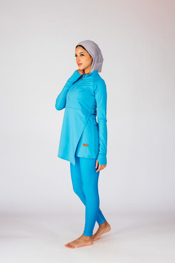 Mono Aqua Zip Neck Asymmetric Hem Swim Top