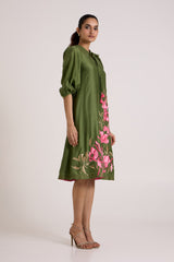 Olive Vinny brunch dress with puff sleeves and floral hem, full length side view
