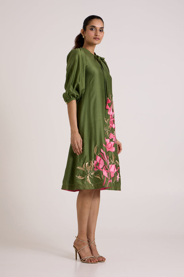 Olive Vinny brunch dress with puff sleeves and floral hem, full length side view