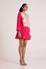Jay pink Cory Victorian dress with long bell sleeves, three quarter front view