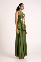 Olive Stacy peplum vest and floor length flare pants, side view