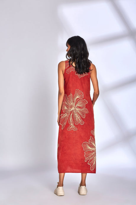 Back view of the Aura Red Dress showing the large cream floral print