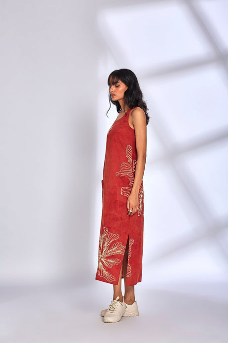 Side view of the Aura Red Dress showing the pocket and side slit