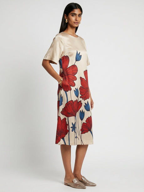 Bea White Modal Dress with hand in pocket and metallic flats, three quarter view