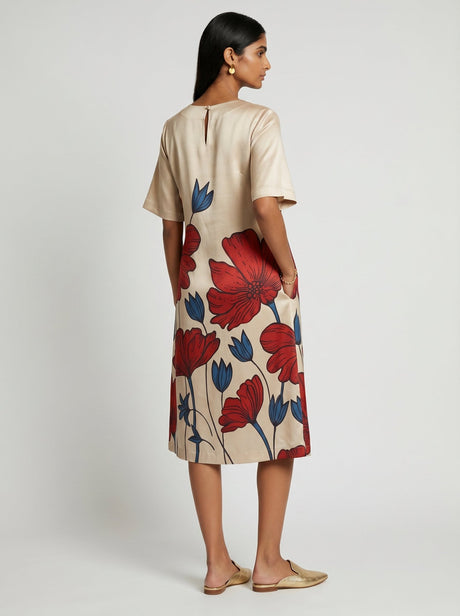 Side back view of the Bea White Modal Dress showing the keyhole button and floral print