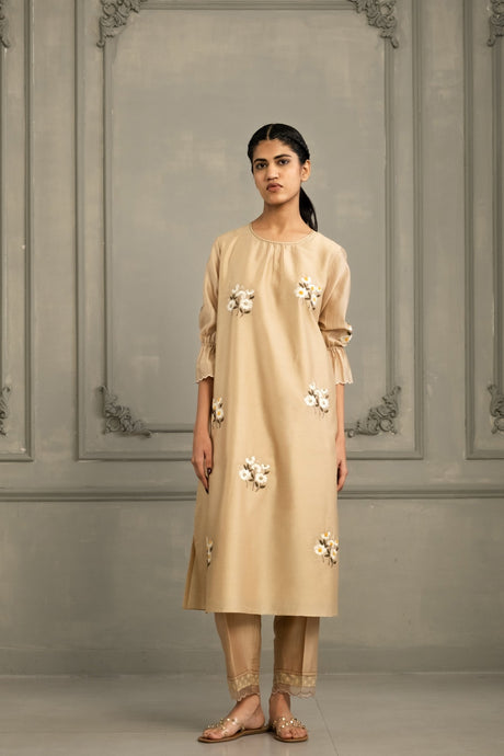 Beige Chanderi Embroidered Tunic Set by ARCVSH by Pallavi Singh with white floral appliques and pants, front view