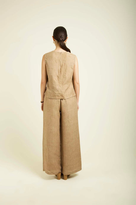 Beige Linen sleeveless top and flared pants without the jacket, back view