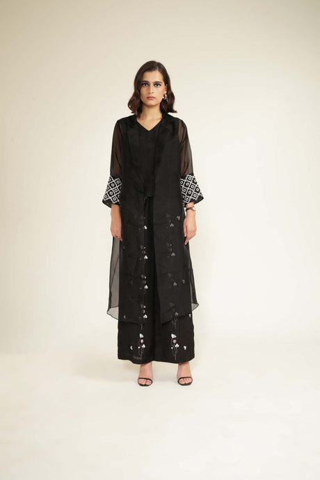 Black Organza Jacket with Embroided Sleeves and Printed Flared Pants by ARCVSH by Pallavi Singh, front view