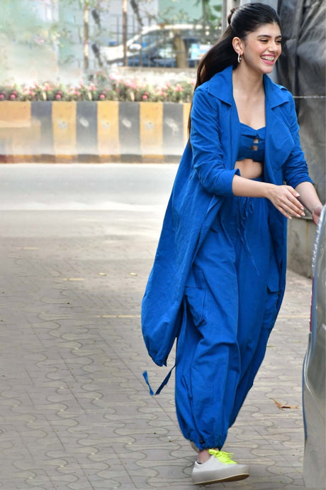 Blue Safari Cargo Trench Set from MATI, cobalt blue trench and cargo pants set worn outdoors, street style view
