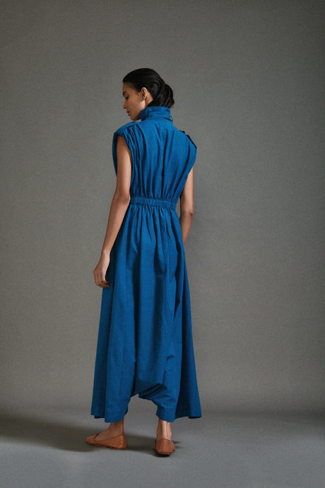 Back view of the Blue Safari Sphara Jumpsuit showing the elasticated waist and wide legs