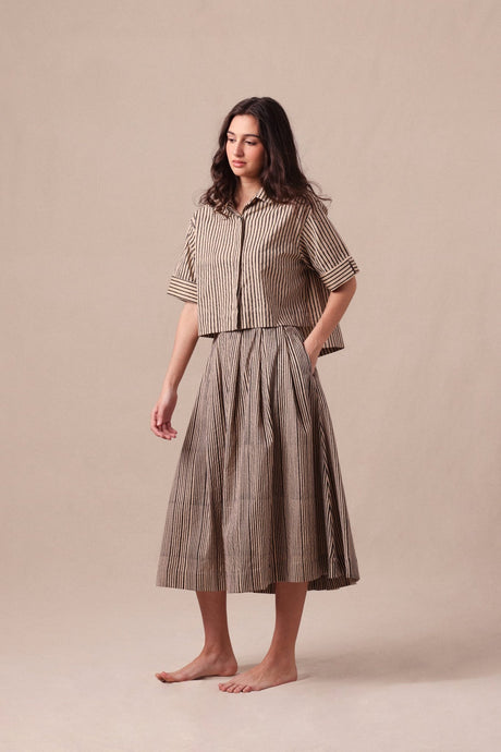 Charcoal Striped Ekin Crop Shirt & Box Pleated Skirt Co-Ord Set by MATI, model three quarter front view