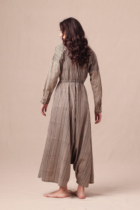 Back view of the Charcoal Striped Shirt Sphara Jumpsuit with elasticated waist and dropped crotch legs