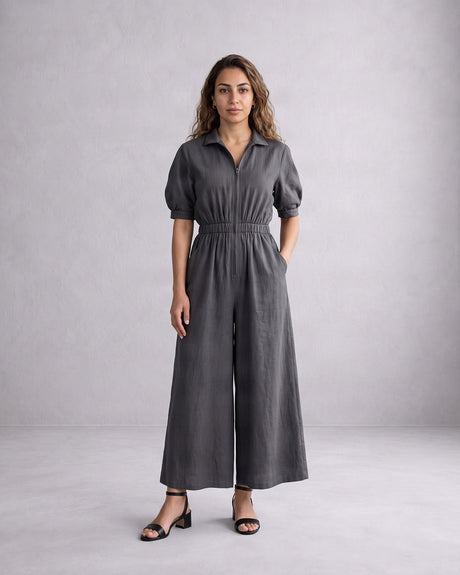 Model wearing the charcoal Collar Sphara Cotton Jumpsuit, full length front view