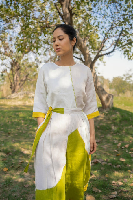 Color block Linen Jumpsuit, closer front view of the round neckline and yellow tie belt