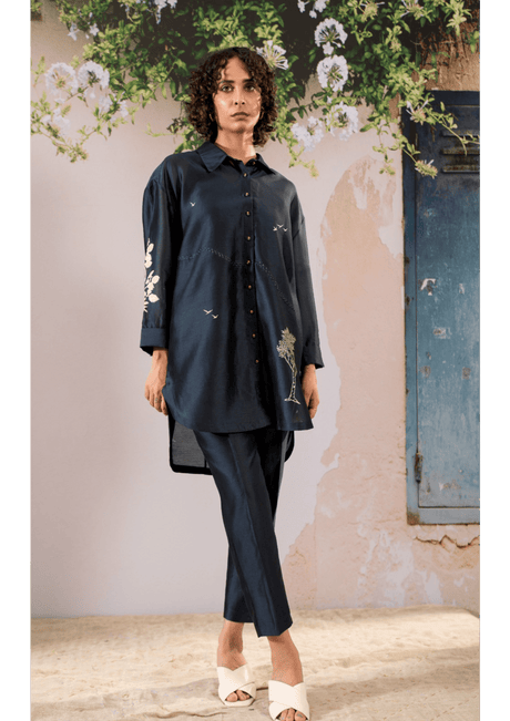 Discharge print oversized shirt and pant set in chanderi from ARCVSH by Pallavi Singh, navy with ivory florals, front view