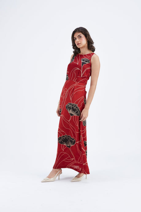 Elara Dress with red and black floral print and side slit, three quarter view