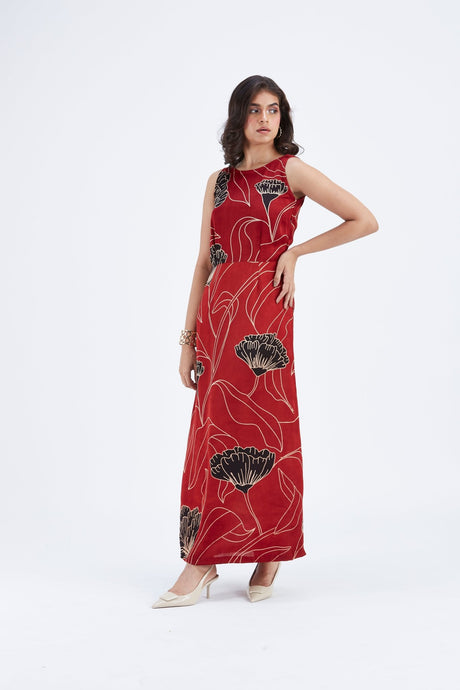 Model wearing the Elara Dress with hand on hip showing the gathered waist, front view