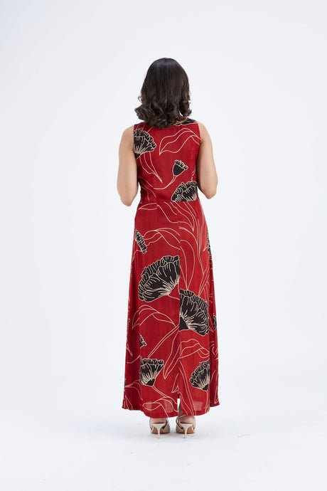 Back view of the Elara Dress showing the black floral motifs and cream lines