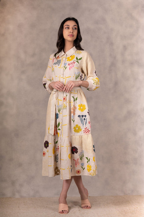 Model wearing the Floral Print Tiered Dress, full length front view with tiered skirt